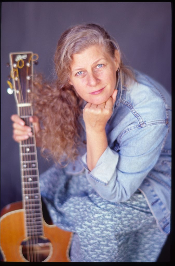 Kristina Olsen portrait with guitar